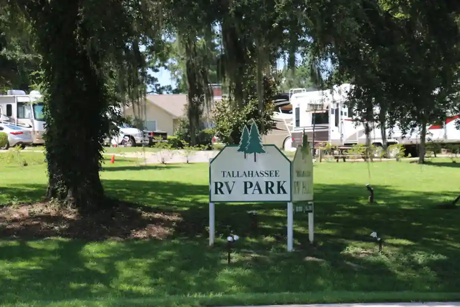 Park entrance sign reading Tallahassee RV Park