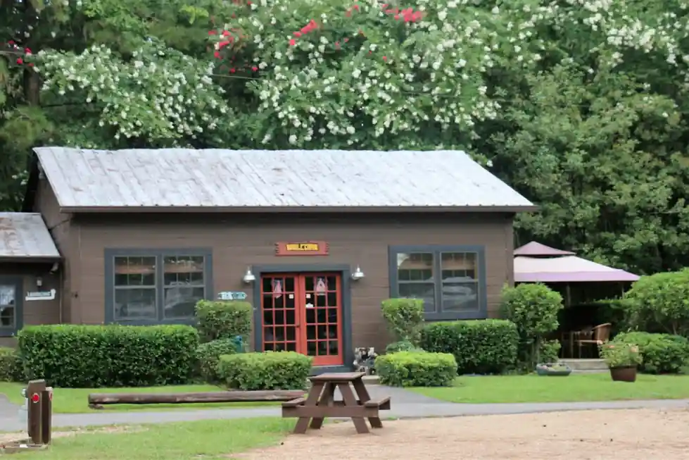 Office cabin with a picnic table out front